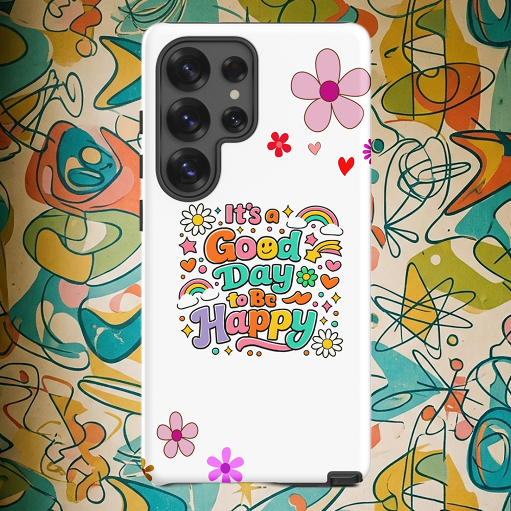 Vibrant retro typography "It’s a Good Day to Be Happy" with rainbows and daisies on a black Samsung Galaxy phone case.