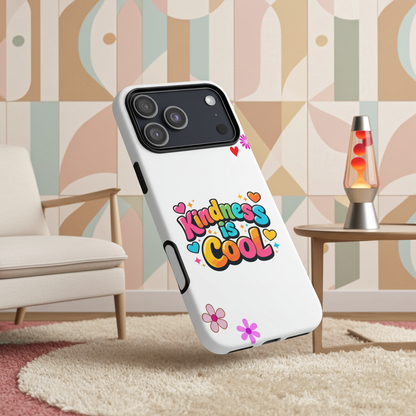 Colorful "Kindness is Cool" bubble text with bright hearts and stars on a black protective iPhone phone case.