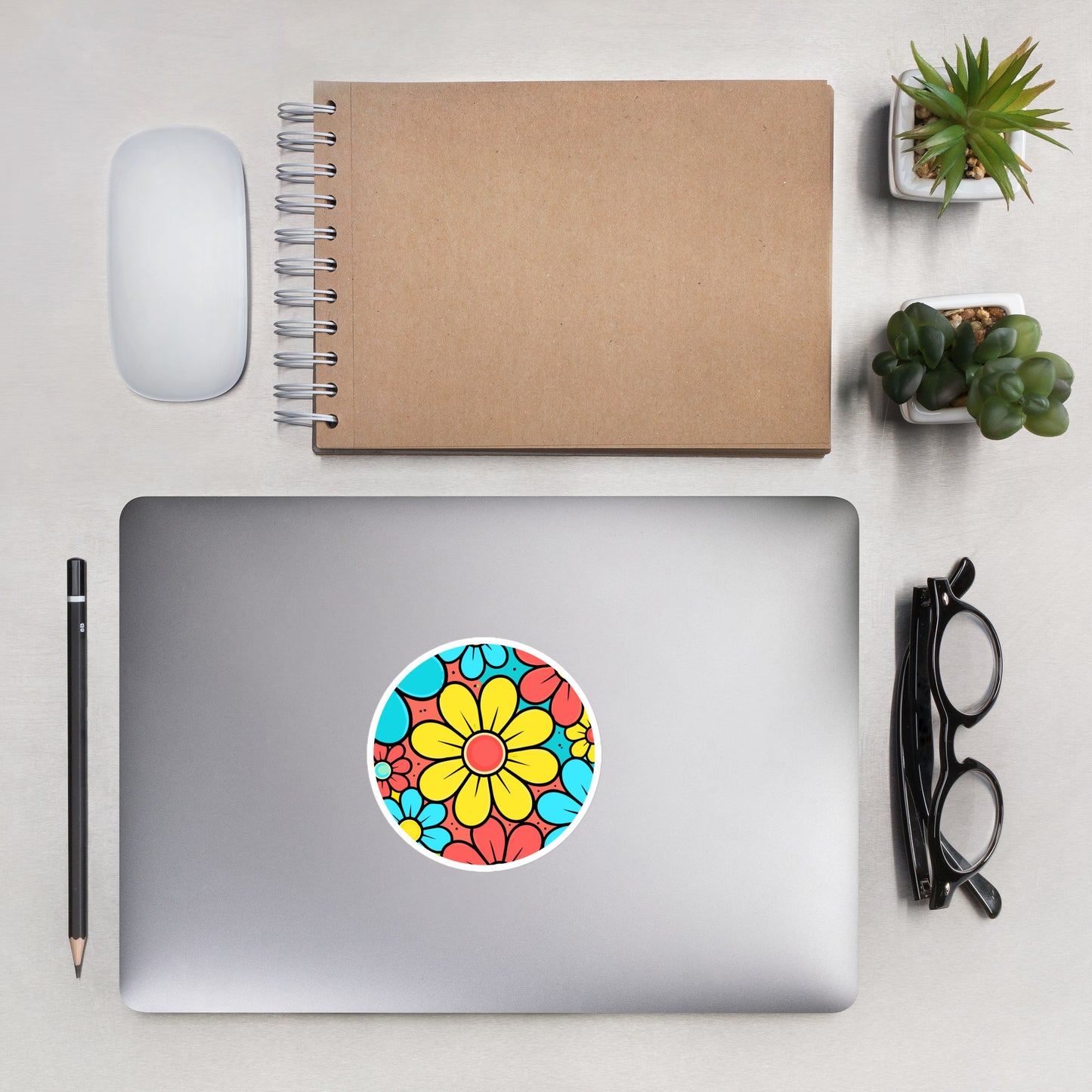Colorful retro 60s style flower power floral pattern sticker with blue, yellow, and red blossoms.
