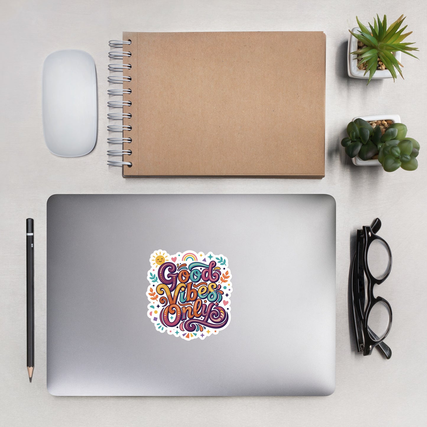 Colorful retro sticker with 'Good Vibes Only' text, rainbow, sun, and stars in a 70s psychedelic art style.