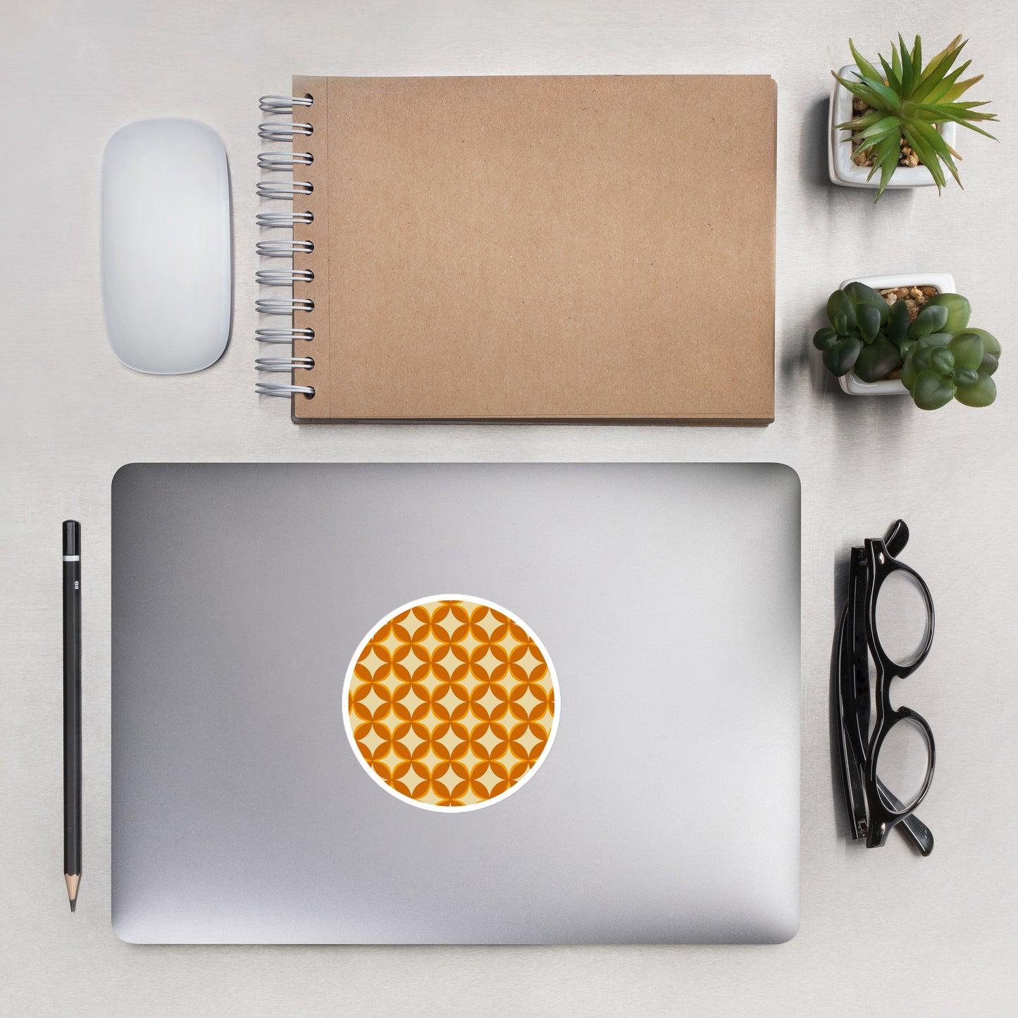 Seamless 70s retro geometric pattern sticker featuring interlocking orange and mustard petal shapes on a cream background.