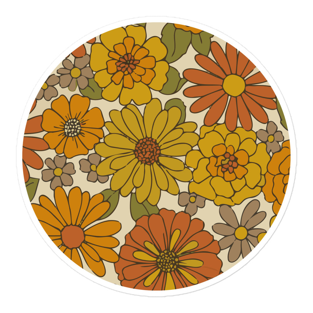 A seamless retro groovy floral pattern with orange, yellow, and cream daisy blooms
