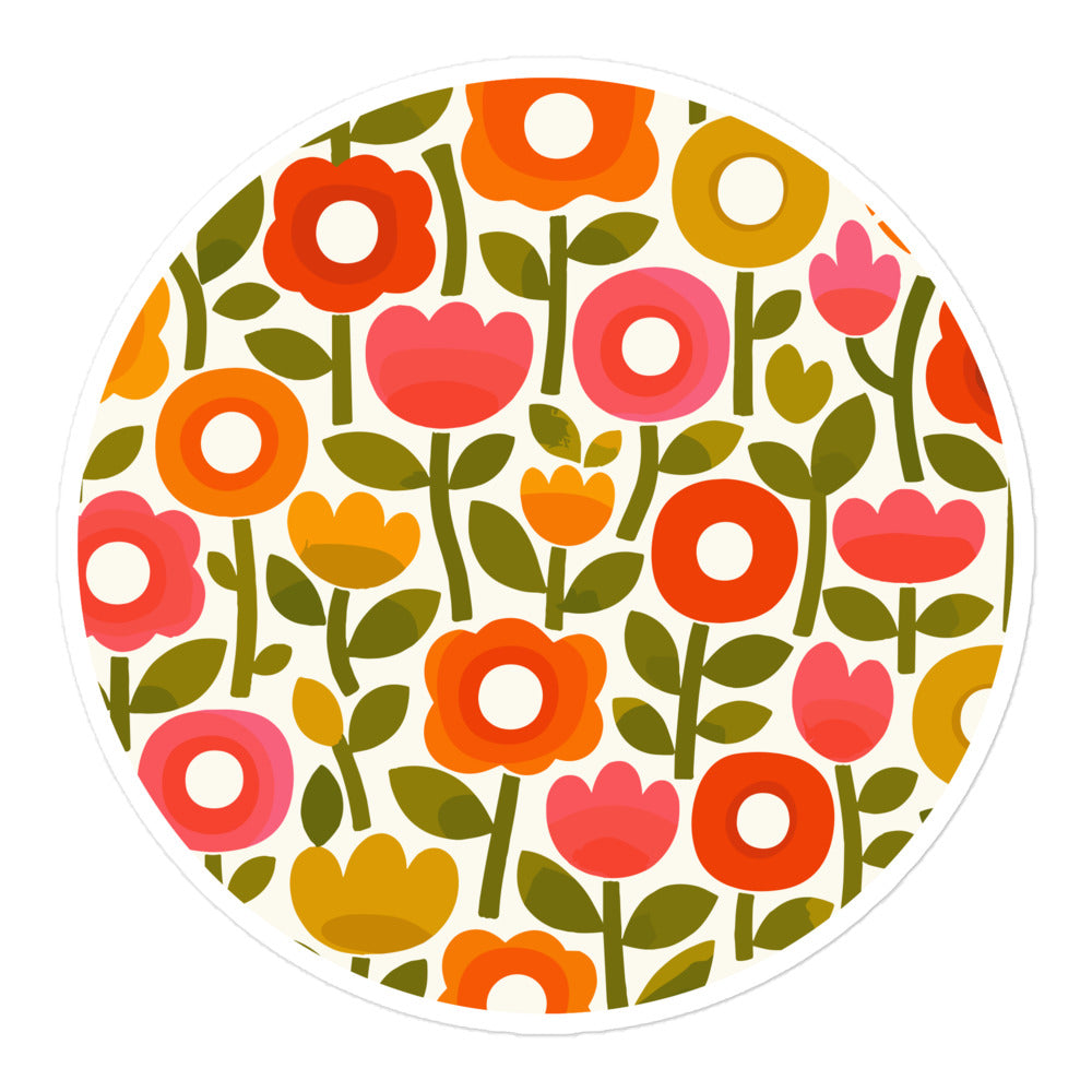 Retro 1970s flower power pattern vinyl sticker featuring geometric orange, pink, and yellow flowers with green leaves