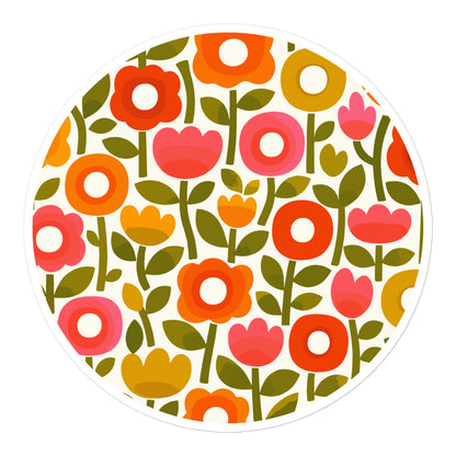 Retro 1970s flower power pattern vinyl sticker featuring geometric orange, pink, and yellow flowers with green leaves