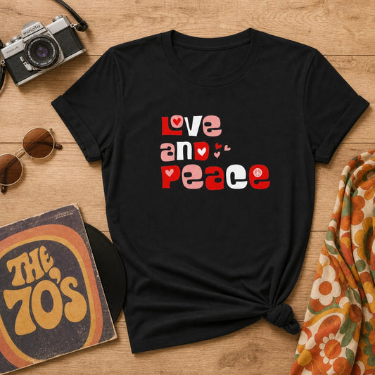 Unisex t-shirt featuring retro Love and Peace aesthetic typography in a vibrant 1970s groovy font and vintage colors.
