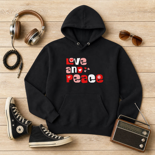 Unisex hoodie with retro Love and Peace aesthetic typography in a 1970s groovy font and vibrant vintage colors.