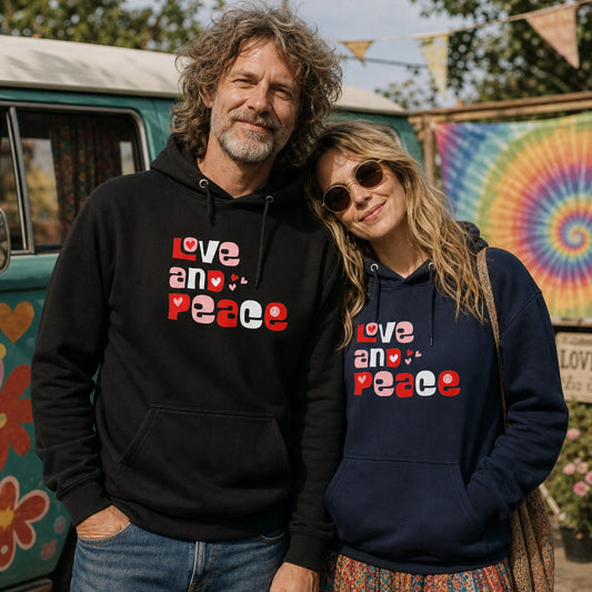 Unisex hoodie with retro Love and Peace aesthetic typography in a 1970s groovy font and vibrant vintage colors.