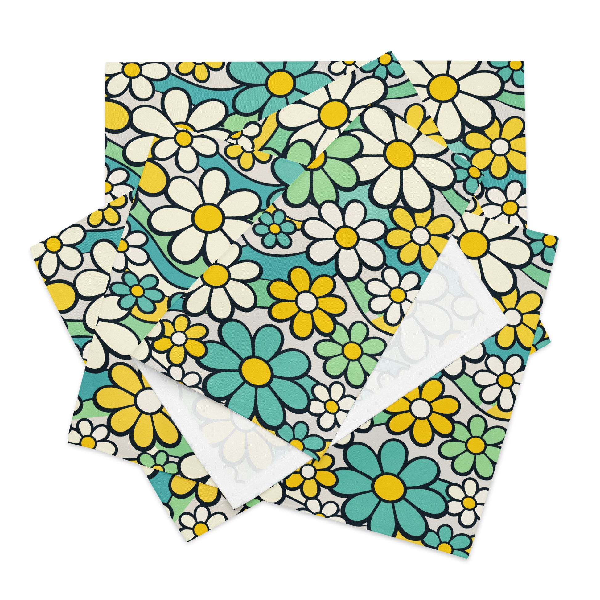 Top-down view of four retro placemats featuring a colorful 1970s psychedelic daisy pattern with teal and yellow flowers.