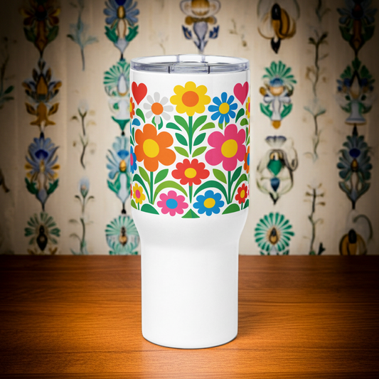 Vibrant 70s style retro flower power design with colorful daisies and hearts on a white stainless steel travel mug. faroutgoods