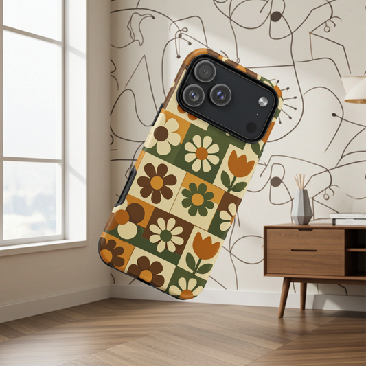 TPU iPhone case featuring a 1970s retro floral tile pattern in orange, brown, and green by Far Out Goods.