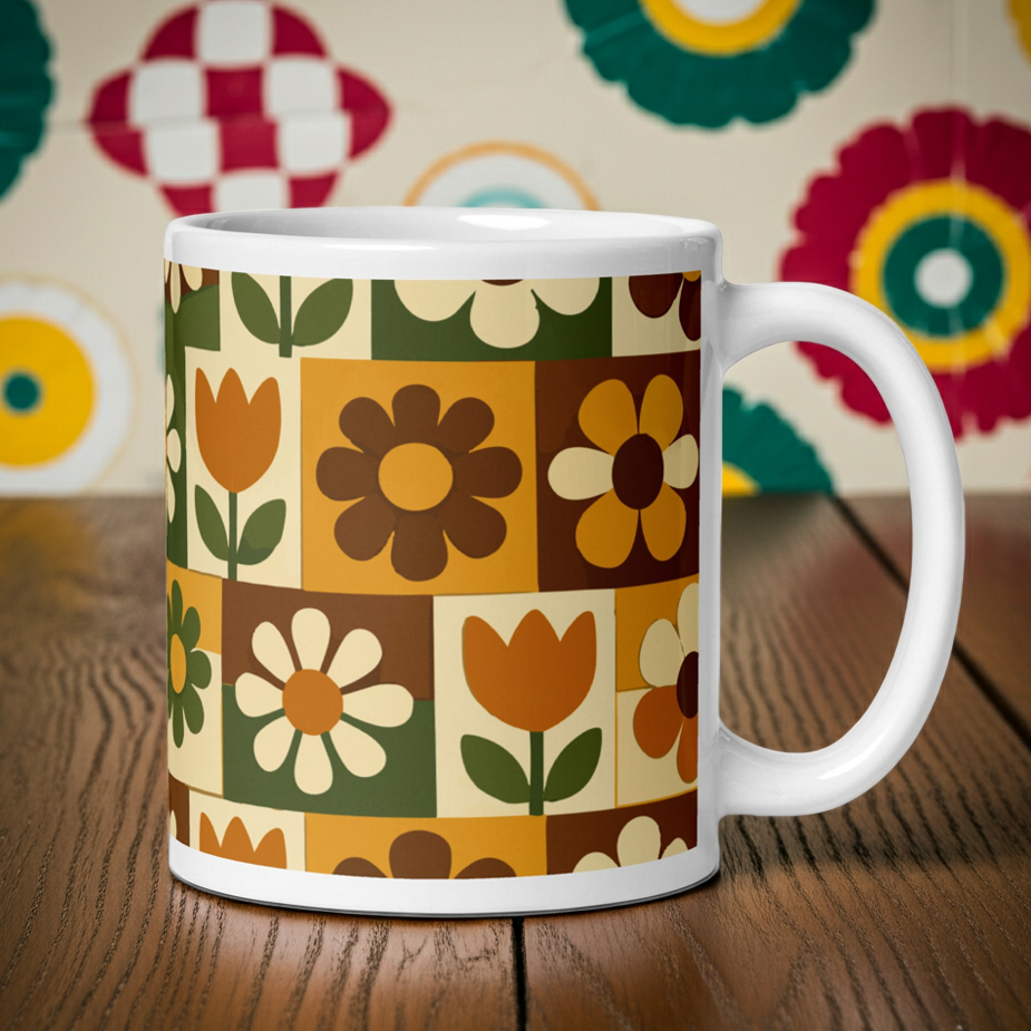 Ceramic mug featuring a 1970s retro floral grid pattern with groovy flowers in orange, brown, and olive green.