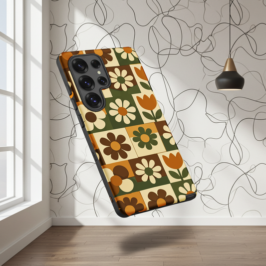 TPU Samsung Galaxy case featuring a 1970s retro floral tile pattern in orange and green by Far Out Goods.