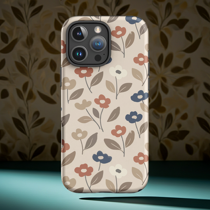 Dual-layer iPhone case featuring a retro mod flower pattern with large stylized blossoms in mustard yellow, burnt orange, and cream on a glossy finish.