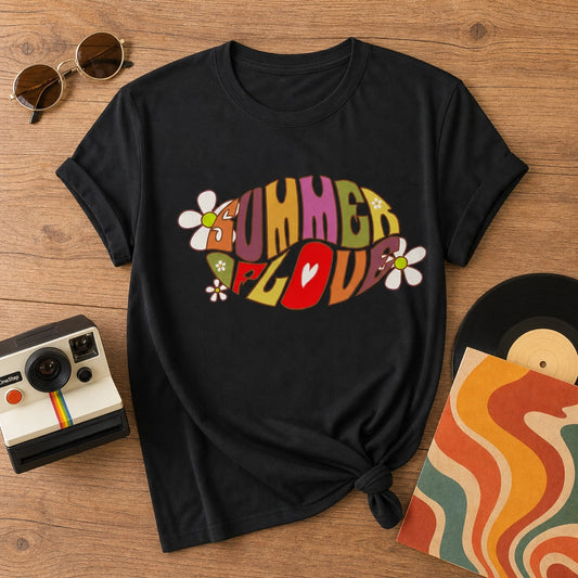 Unisex t-shirt featuring retro Summer of Love psychedelic typography in a vibrant 60s groovy font and vintage color palette.