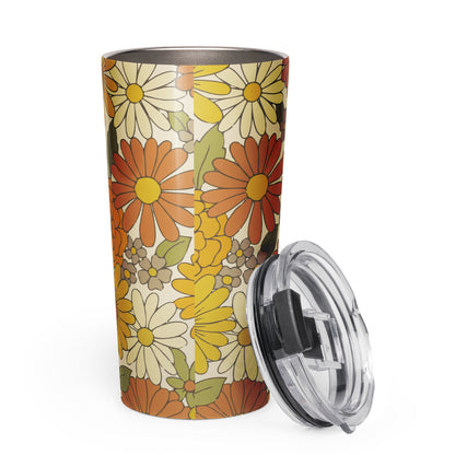 A stainless steel travel tumbler featuring a seamless retro groovy floral pattern with warm orange and yellow daisy blooms.