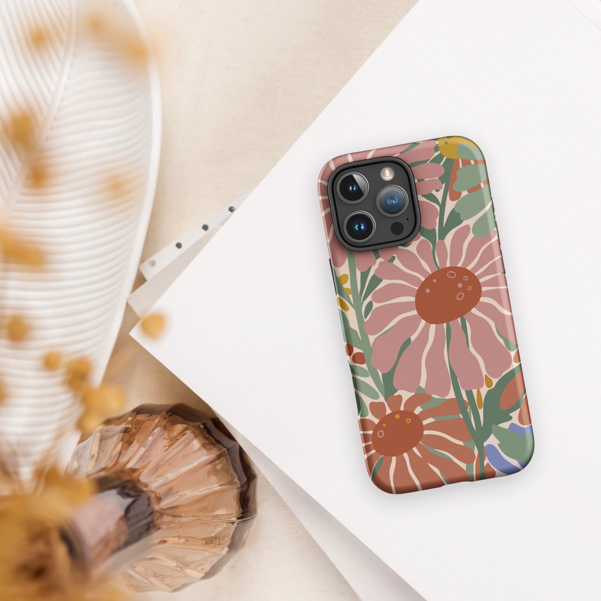 70s style flower power pattern with pink, green, and orange daisies on a bohemian iPhone phone case.