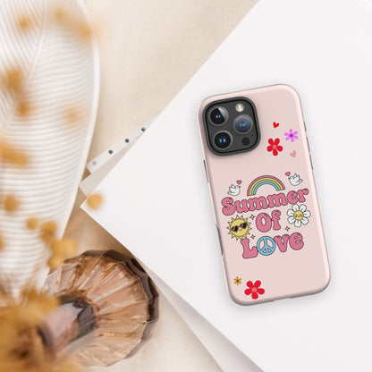 Retro "Summer of Love" design with pink bubble letters, a rainbow, peace sign, and smiling daisy on a black iPhone case.