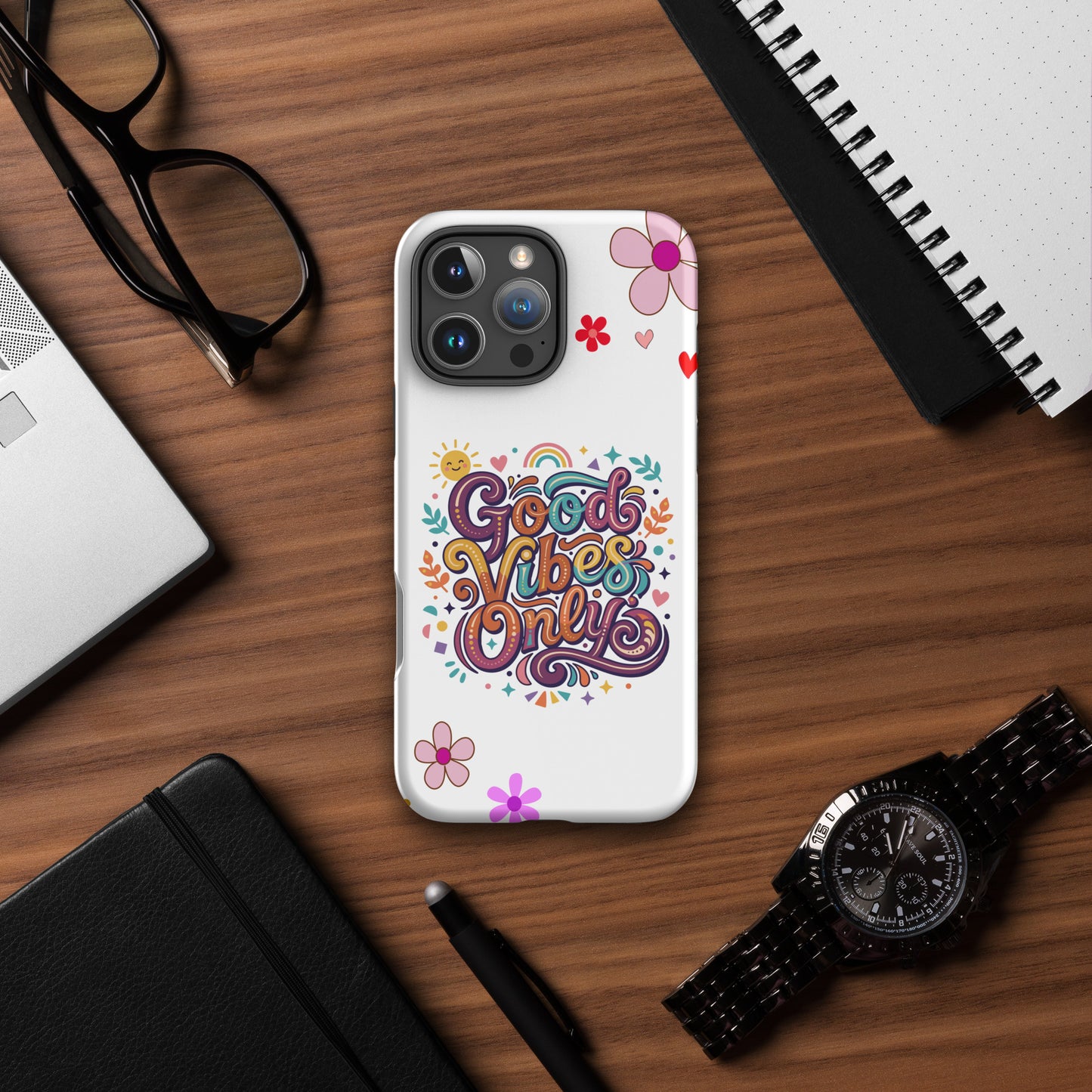 Vibrant iPhone case with 'Good Vibes Only' groovy text, rainbow, sun, and stars in a 70s psychedelic style.