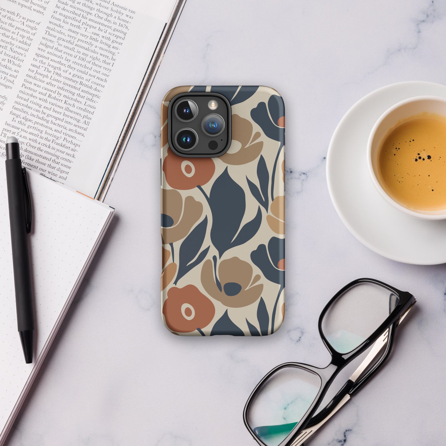 Protective TPU iPhone case featuring a seamless retro floral print in terracotta, ochre, and deep navy blue.