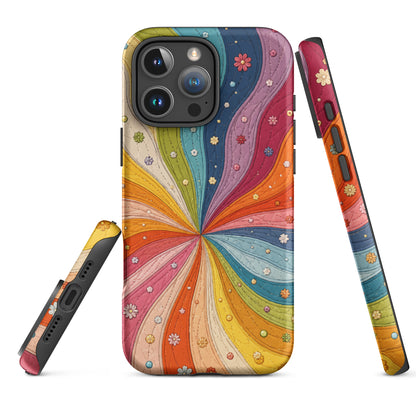 Flexible TPU iPhone case featuring a vibrant retro 70s quilted rainbow swirl design with stitched details and tiny flowers.