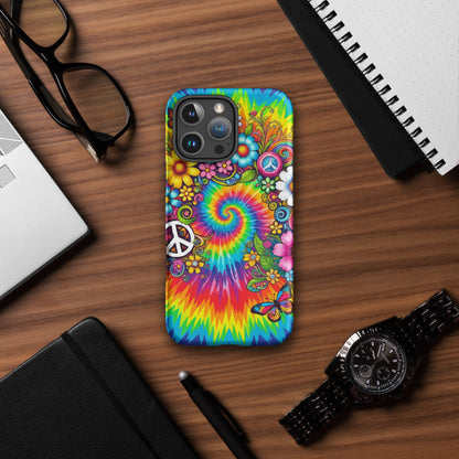 Vibrant psychedelic tie dye TPU iPhone case featuring retro floral patterns, butterflies, and white peace signs.