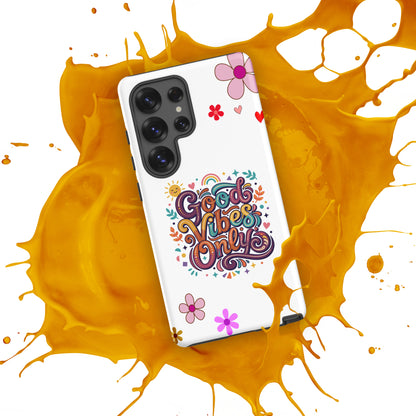 Samsung Galaxy case with 'Good Vibes Only' groovy text, rainbows, and sun illustrations in a 70s psychedelic style.