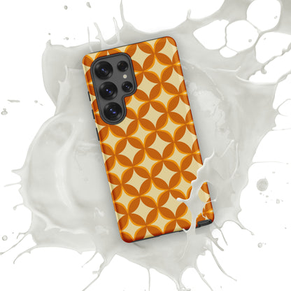 Protective Samsung Galaxy phone case featuring a 1970s retro geometric pattern of orange and mustard petal shapes.