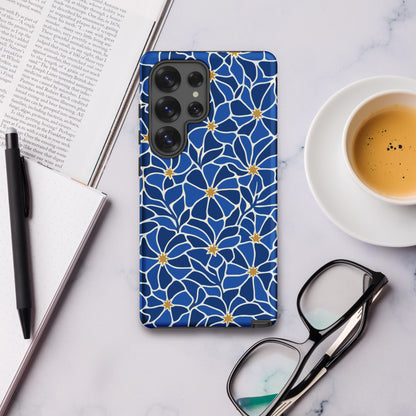 Vibrant blue mosaic floral pattern Samsung case with navy petals and gold star centers by Far Out Goods.