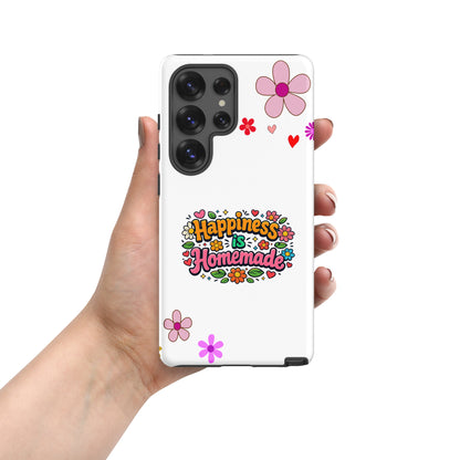 Groovy Samsung Galaxy case with 'Happiness is Homemade' text, surrounded by 70s flowers and hearts on a black background.