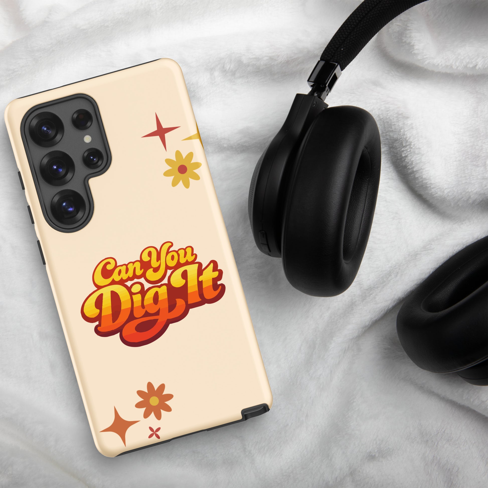 Retro 70s style typography reading Can You Dig It in sunset orange and yellow gradient on a black Samsung Galaxy case.