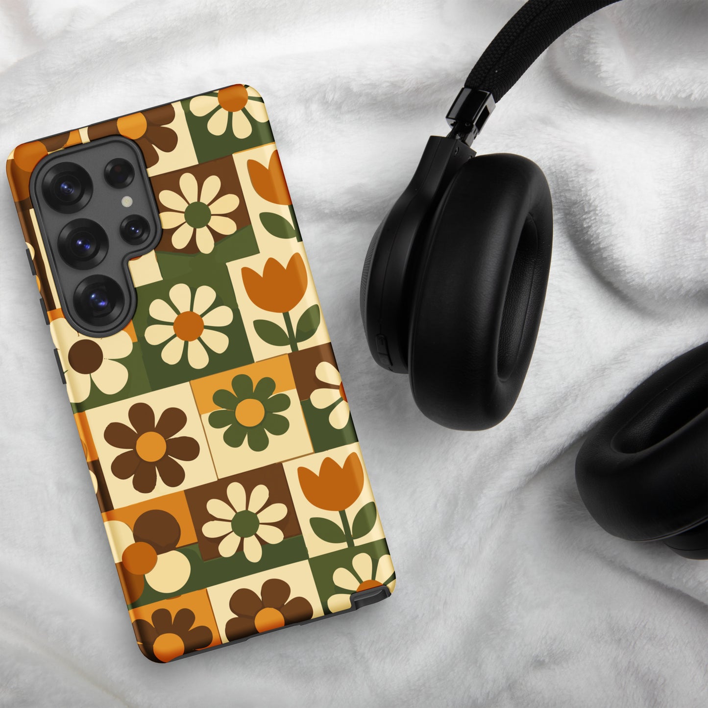 TPU Samsung Galaxy case featuring a 1970s retro floral tile pattern in orange and green by Far Out Goods.