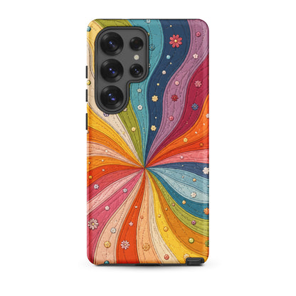 Flexible TPU Samsung Galaxy case featuring a vibrant retro 70s quilted rainbow swirl design with stitching and tiny flowers.