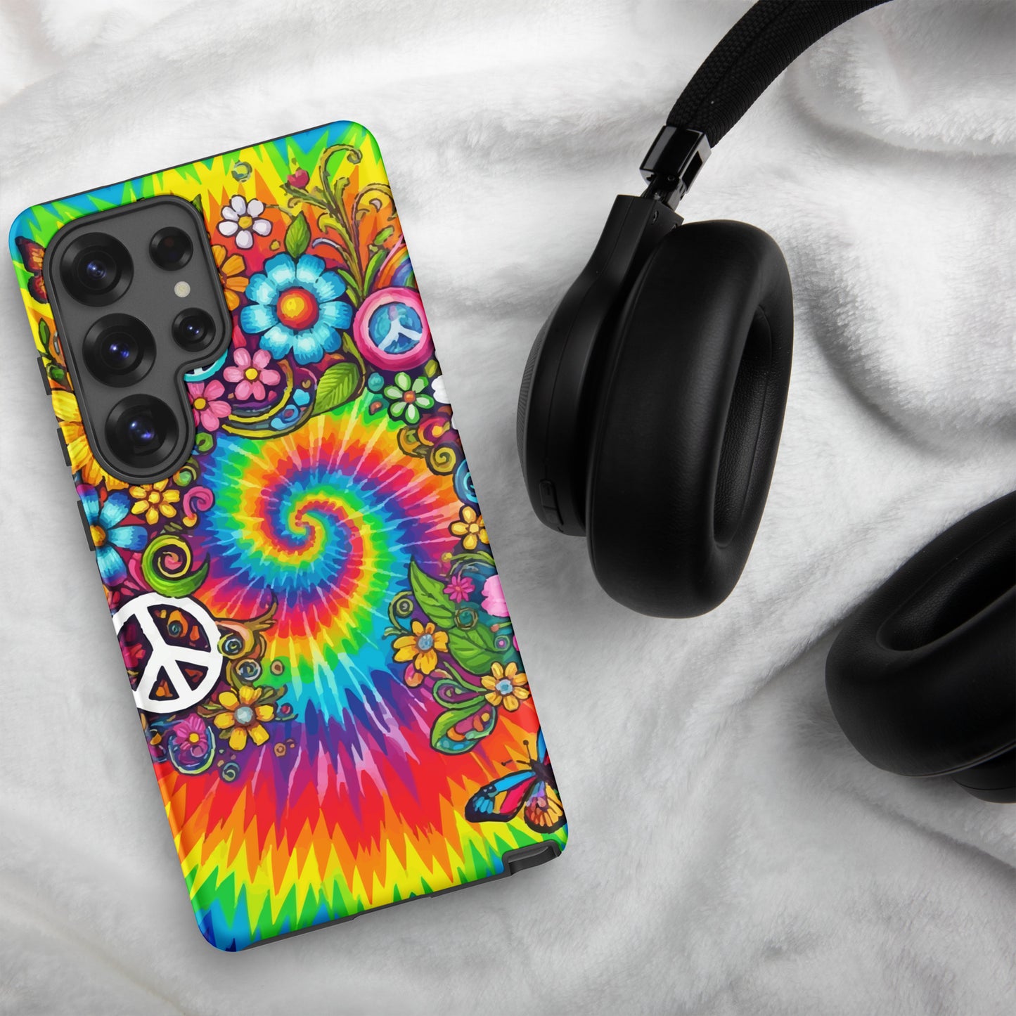 Vibrant psychedelic tie dye TPU Samsung case featuring retro floral patterns, butterflies, and white peace signs.