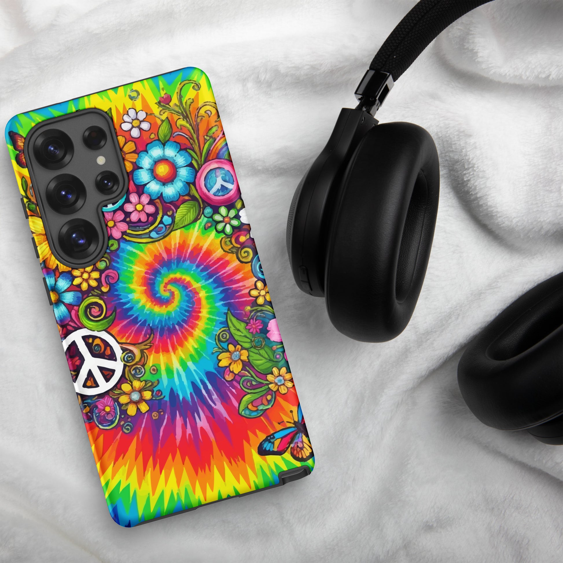 Vibrant psychedelic tie dye TPU Samsung case featuring retro floral patterns, butterflies, and white peace signs.