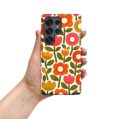 Retro 1970s flower power pattern TPU Samsung case featuring geometric orange, pink, and yellow flowers with green leaves