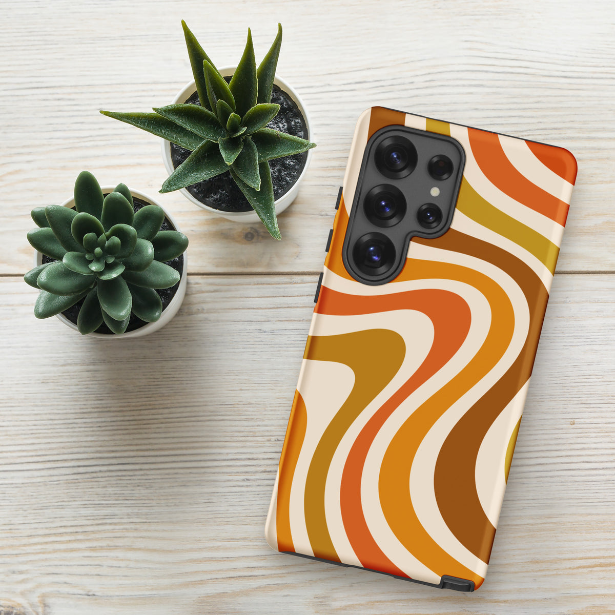 Retro 70s groovy wavy pattern in orange, mustard, brown, and cream printed on a flexible TPU Samsung protective case.