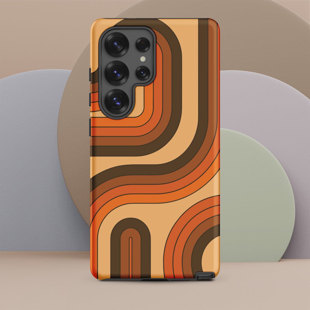 Retro 70s curved stripe pattern in earth tones, brown, and orange printed on a flexible TPU Samsung Galaxy phone case.