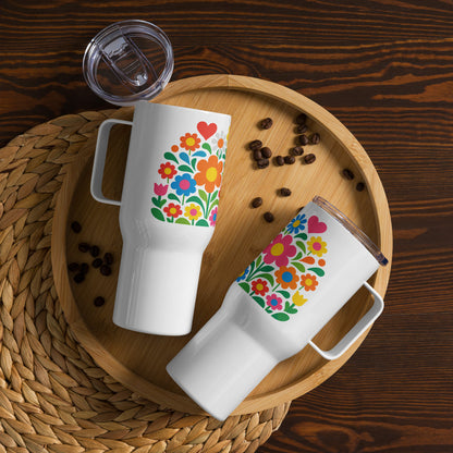 Vibrant 70s style retro flower power design with colorful daisies and hearts on a white stainless steel travel mug. faroutgoods