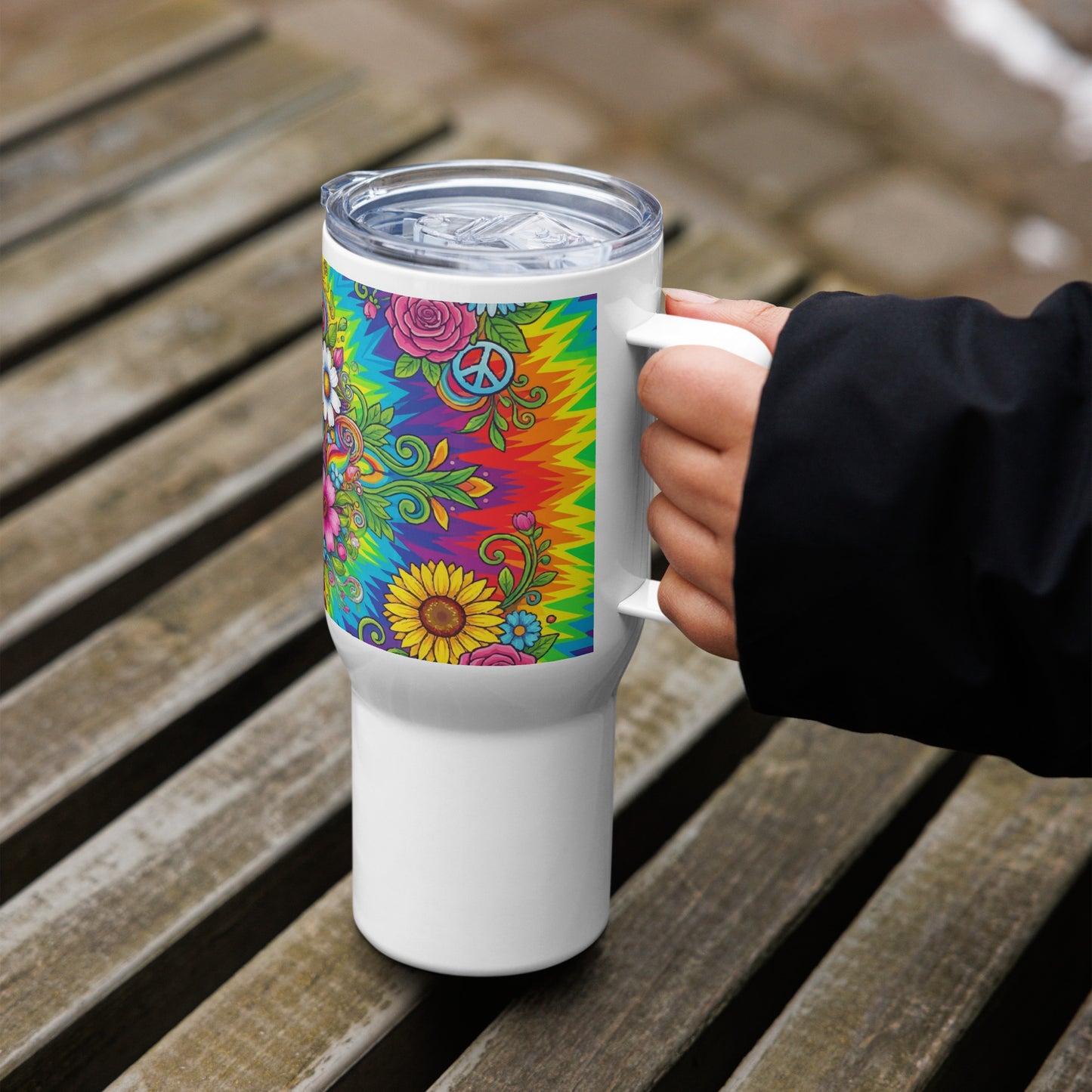 Vibrant psychedelic tie dye stainless steel travel mug featuring colorful retro flowers, butterflies, and peace signs.