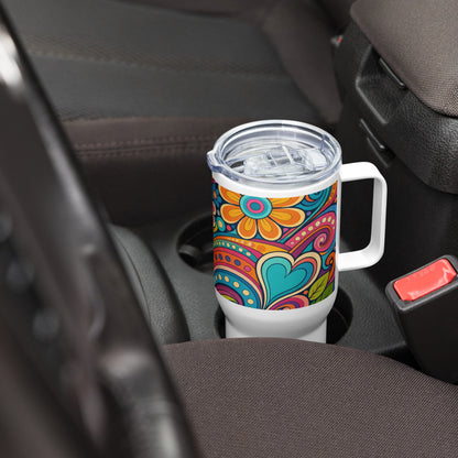 Stainless steel travel tumbler featuring a colorful 70s psychedelic pattern of groovy flowers, swirls, and hearts.