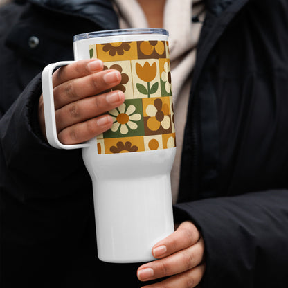 Stainless steel travel mug with a 1970s retro floral grid pattern of groovy flowers in orange, brown, and olive green.