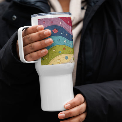 Stainless steel travel mug featuring a vibrant 70s retro quilted rainbow swirl design with stitched details and flowers.