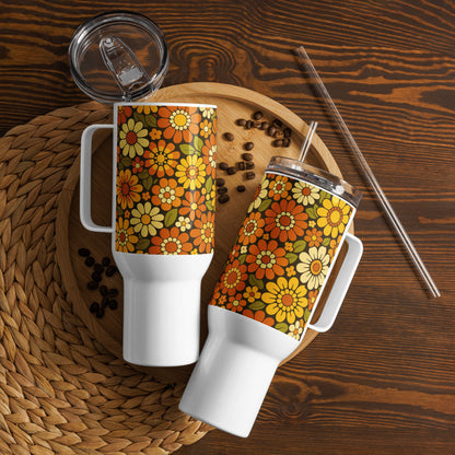 Retro 70s floral pattern stainless steel travel mug with orange, yellow, and cream daisies on a dark brown background.