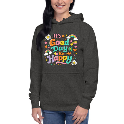 Colorful retro typography reading It’s a Good Day to Be Happy with rainbows and daisies on a black hoodie.
