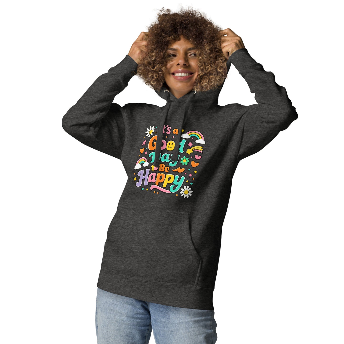 Colorful retro typography reading It’s a Good Day to Be Happy with rainbows and daisies on a black hoodie.