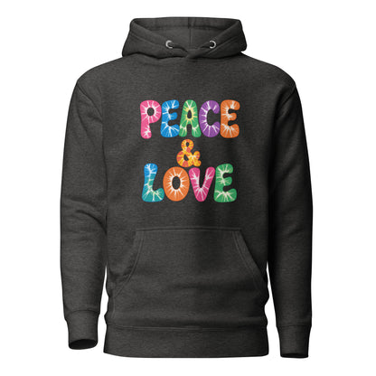 Retro tie-dye Peace and Love lettering printed on a black fleece hoodie pullover with vibrant 60s rainbow typography.