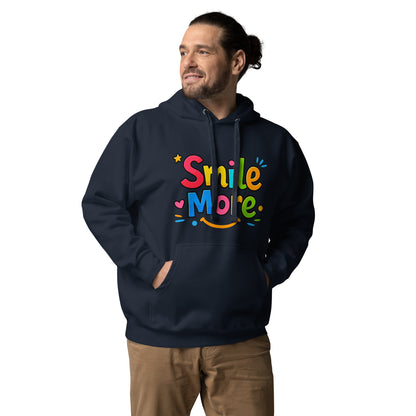 Smile More, bubbly lettering with a yellow sun-smile and pink heart on a black cozy hoodie.