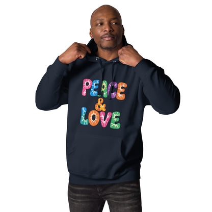 Retro tie-dye Peace and Love lettering printed on a black fleece hoodie pullover with vibrant 60s rainbow typography.