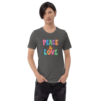 Retro tie-dye Peace and Love lettering printed on a classic black graphic t-shirt with vibrant 60s rainbow typography.