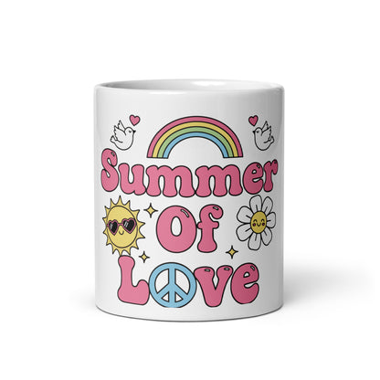 Retro Summer of Love illustration with rainbow, peace sign, sun, and daisy icons in pink and pastel colors on a mug.
